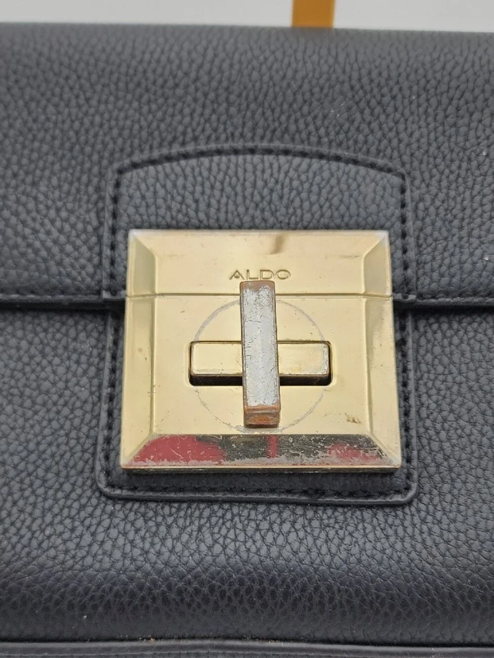 Aldo Black Pebbled Crossbody with Gold Turn-Lock Accent